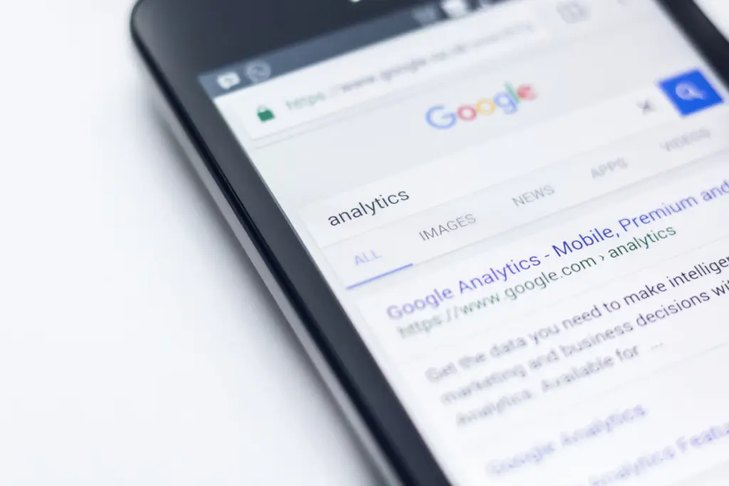 Mobile app search optimization and SEO promotion represented by search analytics on a smartphone