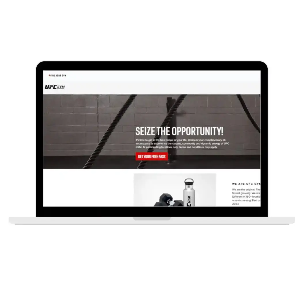 UFC Gym homepage on laptop screen